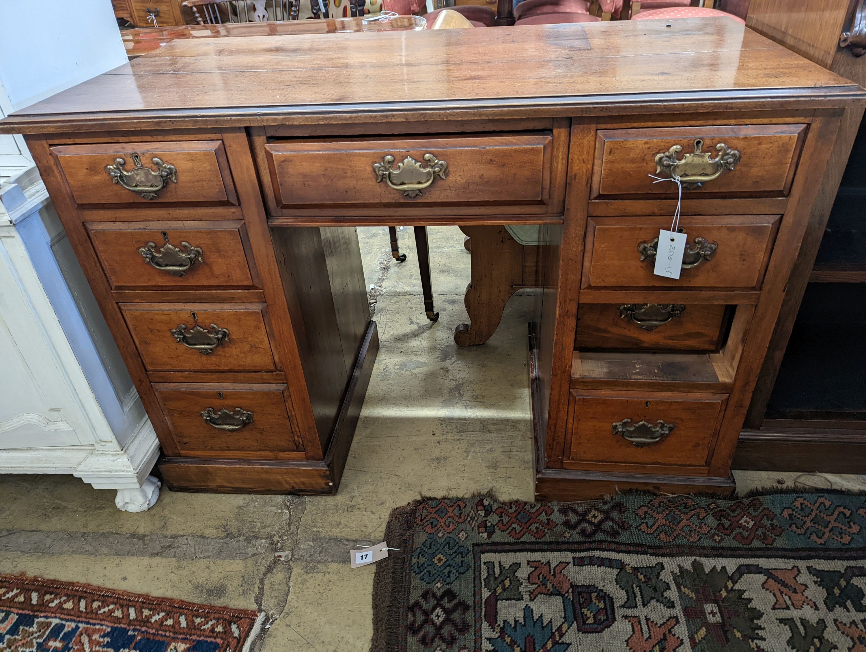 A late Victorian mahogany walnut kneehole desk, length 114cm, depth 55cm, height 78cm